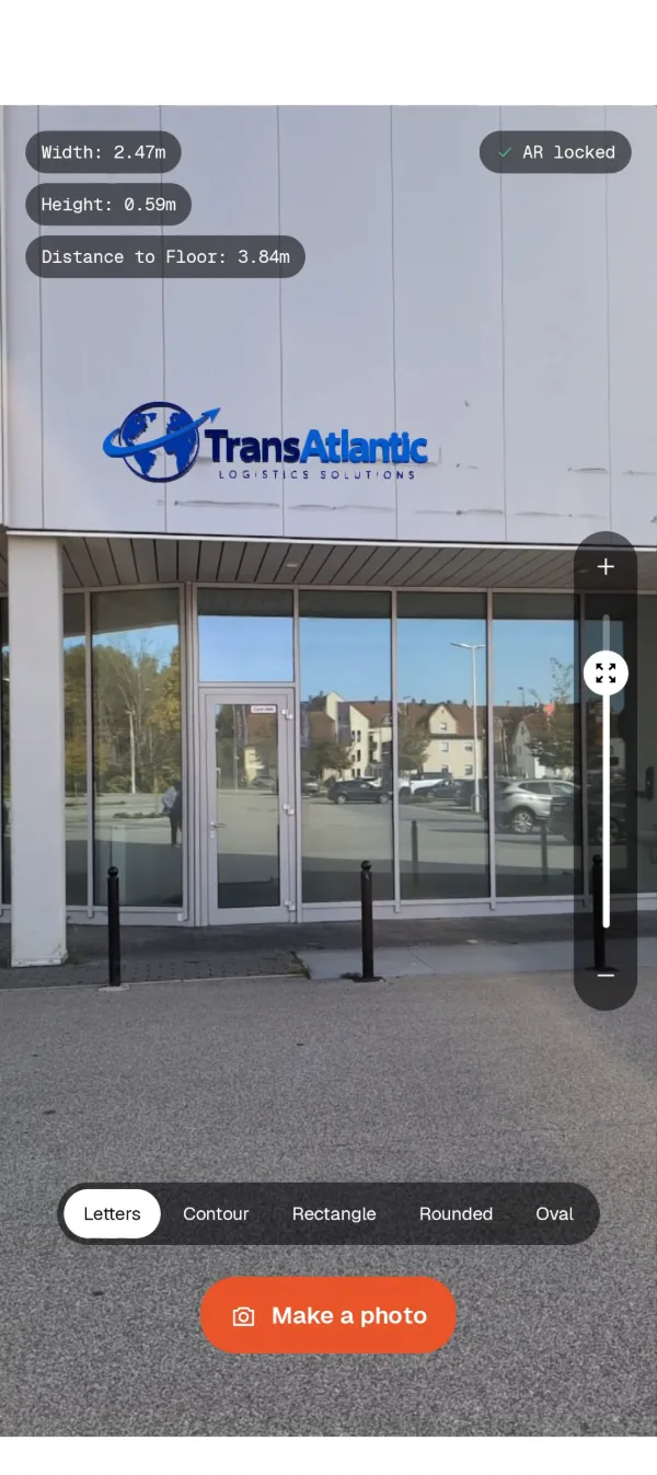 Live AR view: TransAtlantic sign placed on the building facade with width, height and distance to floor, shape options and Make a photo